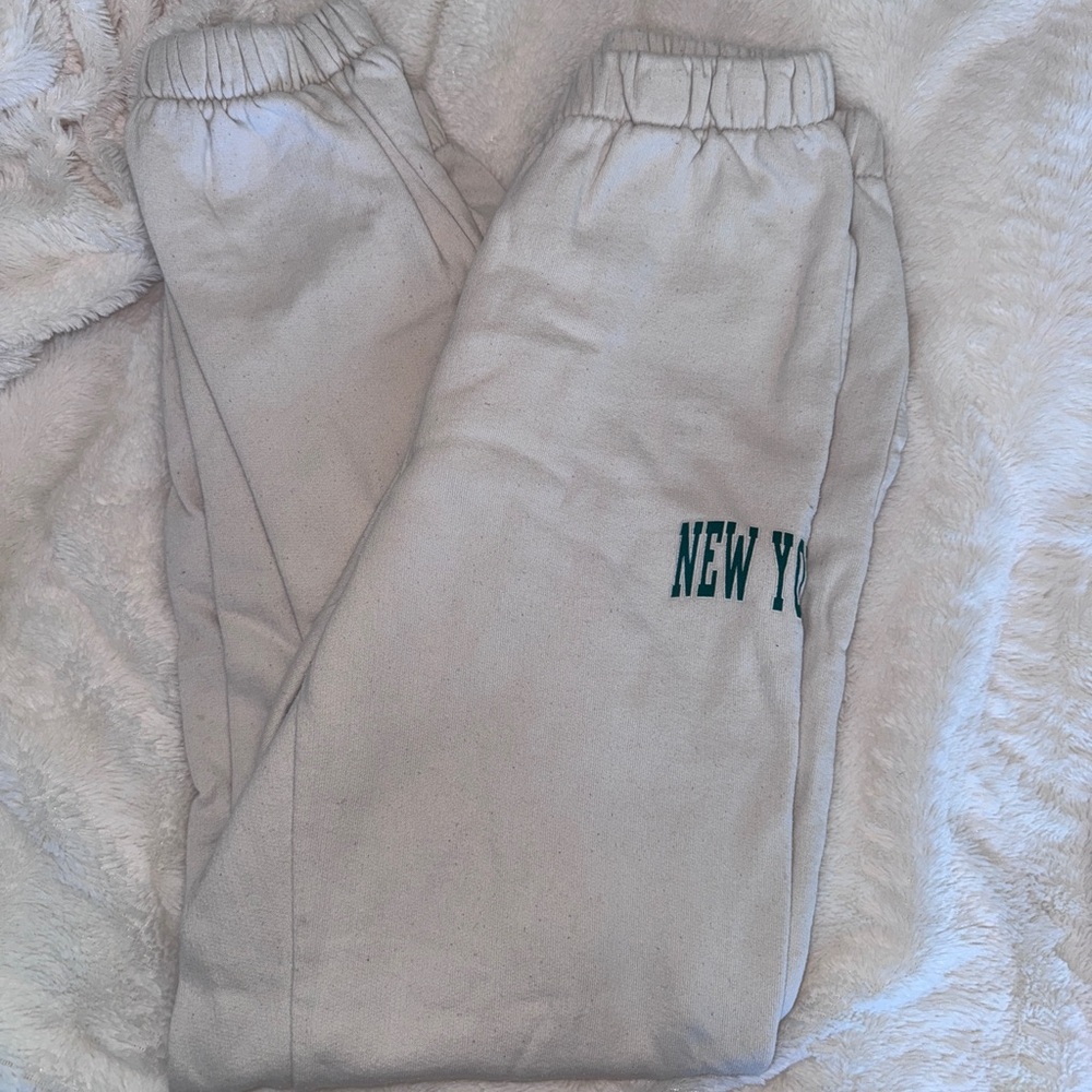 Brandy Melville Cream Joggers with Green Print